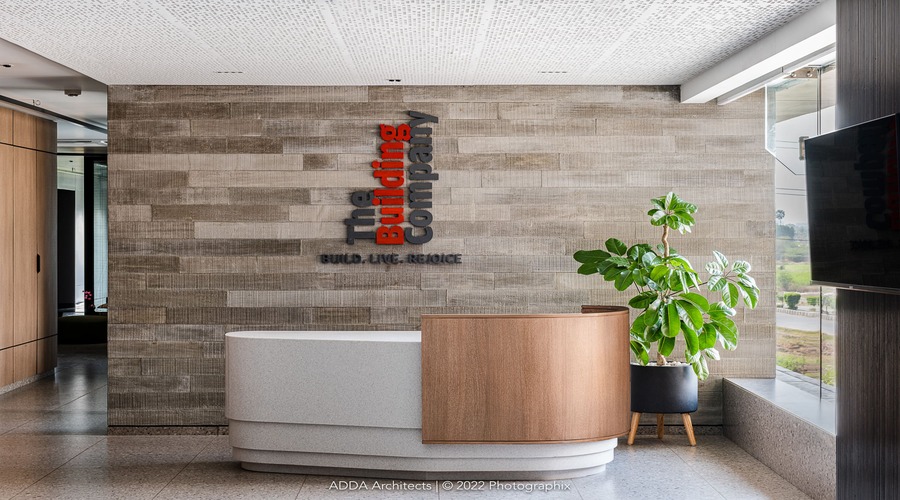 Minimalist office lounge area with stylish seating and modern decor